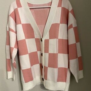 Amazon Pink and White Cardigan Sweater with Bold Checkerboard Design